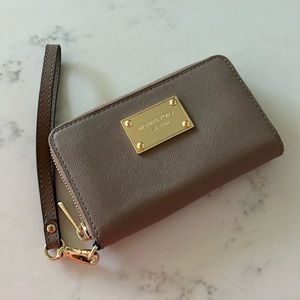 Michael Kors wristlet! Excellent condition! Mushroom/tan color